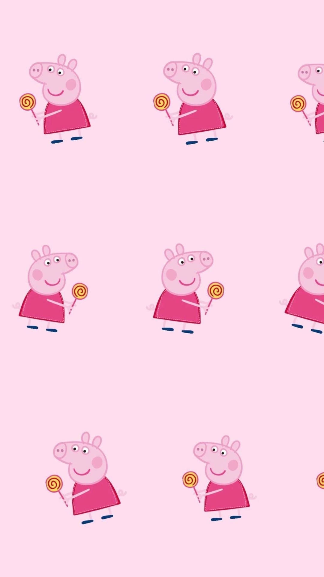 Picha ya mandhari ya iPhone ya Peppa Pig akifurahia lollipop ya kusokota. Picha ya Ukuta