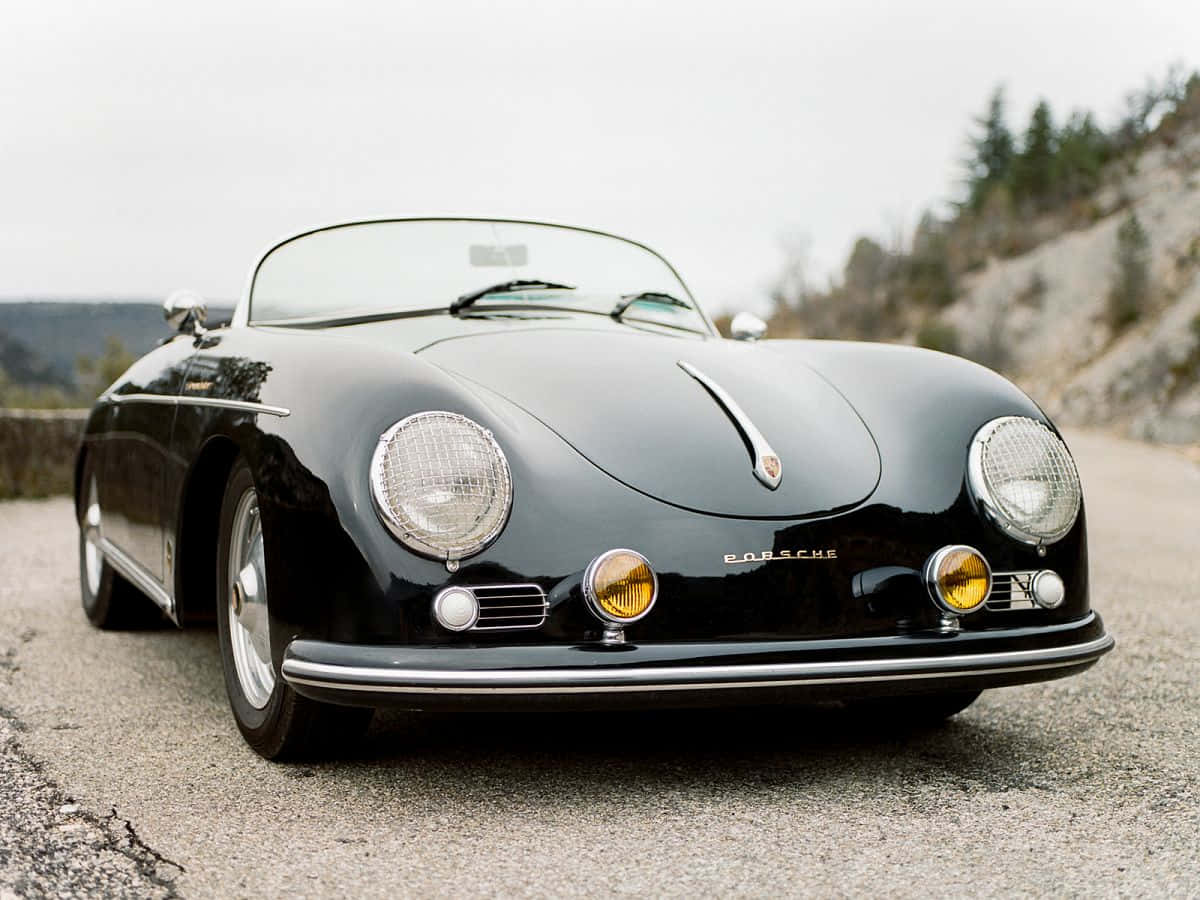 porsche 356 speedster - gari la michezo la kawaida la rangi nyeusi Picha ya Ukuta