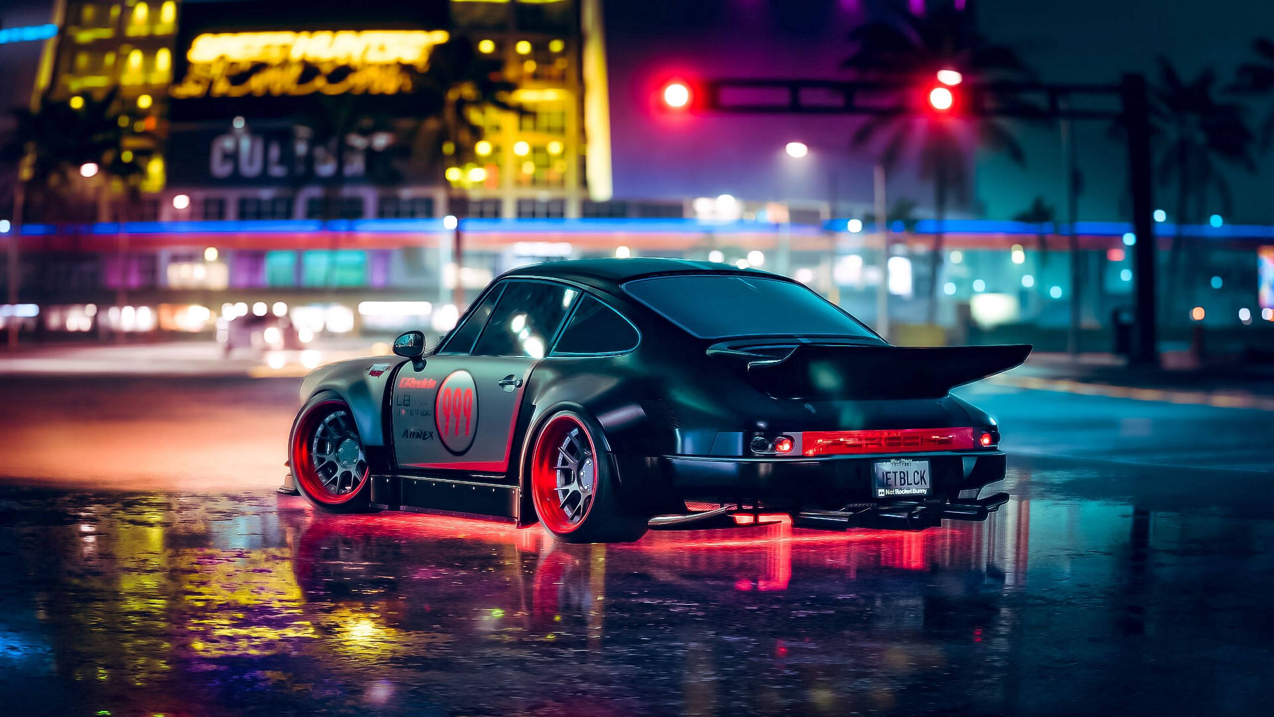 Porsche Nyeusi Karibu na Taa ya Mwanga wa Neon 2560 X 1440 Picha ya Ukuta