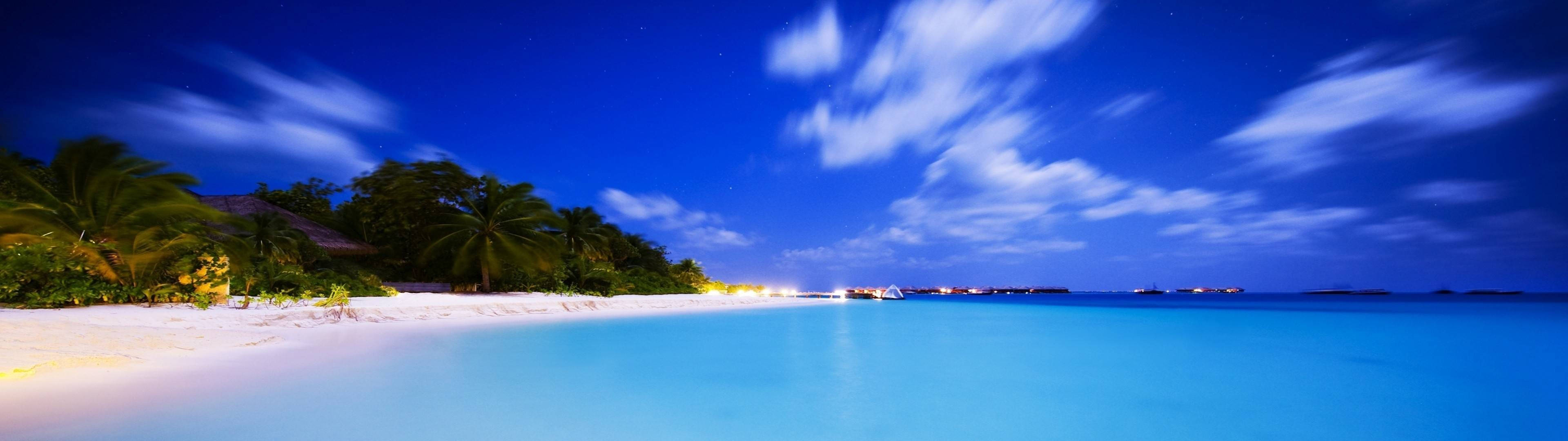 Pwani ina mwonekano wa skrini mbili 3840x1080 HD Picha ya Ukuta