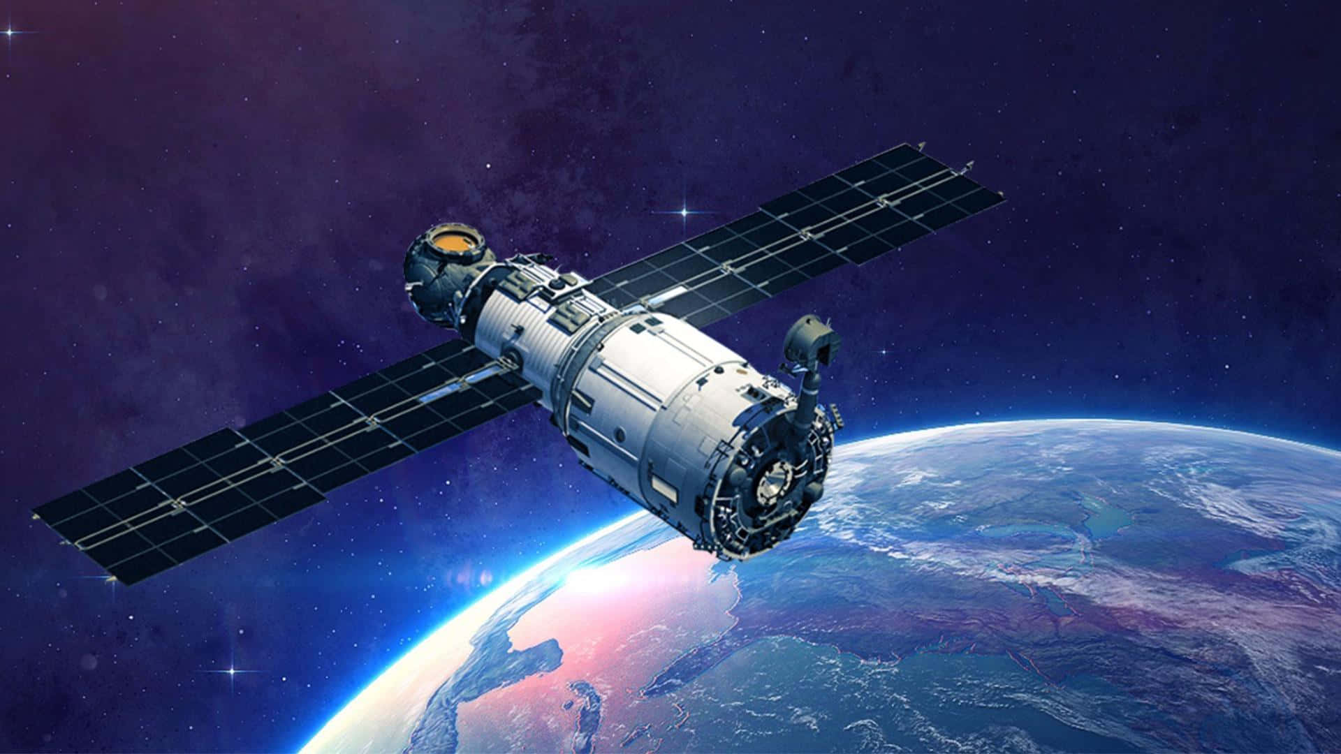 Sateliti inaruka juu ya dunia Picha ya Ukuta