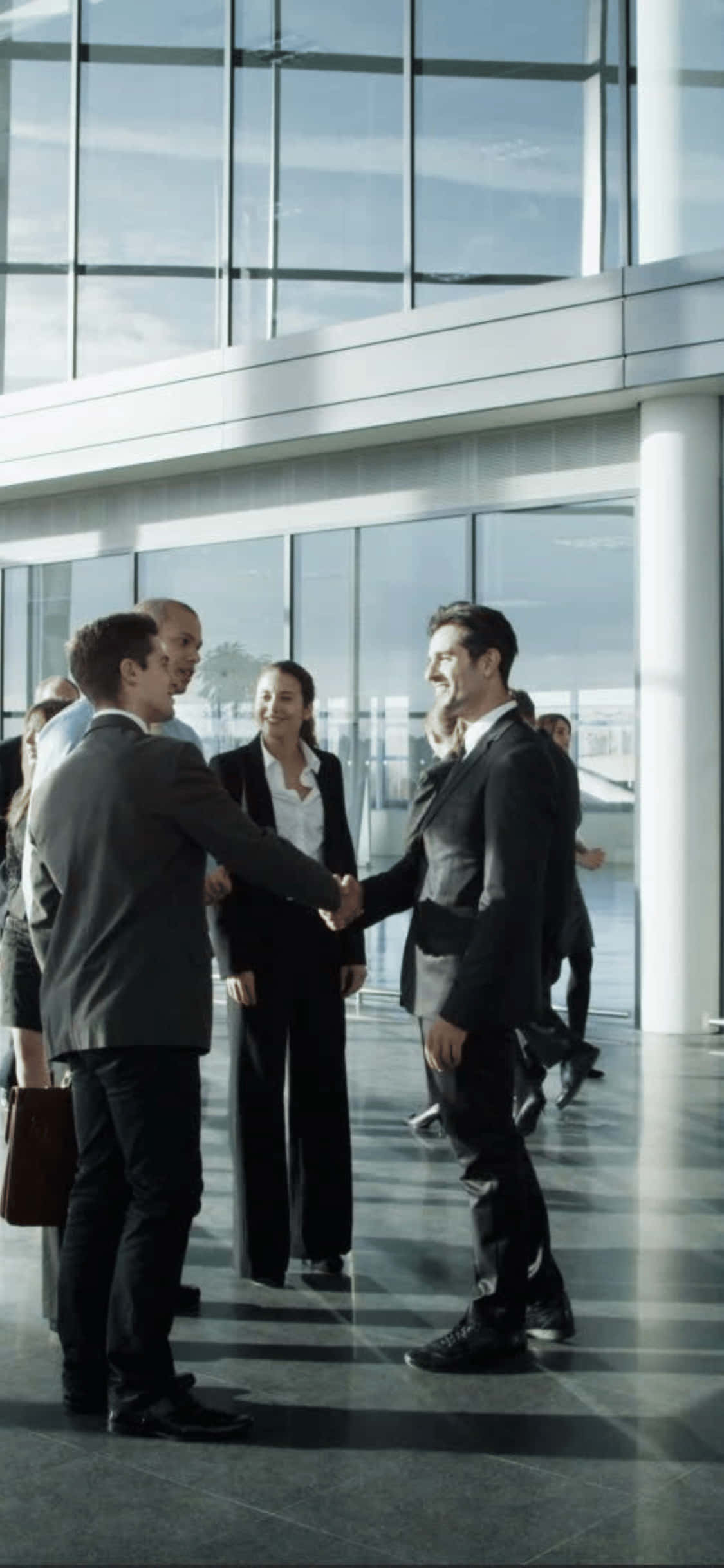 Shaking Hands iPhone X Office Background Picha ya Ukuta