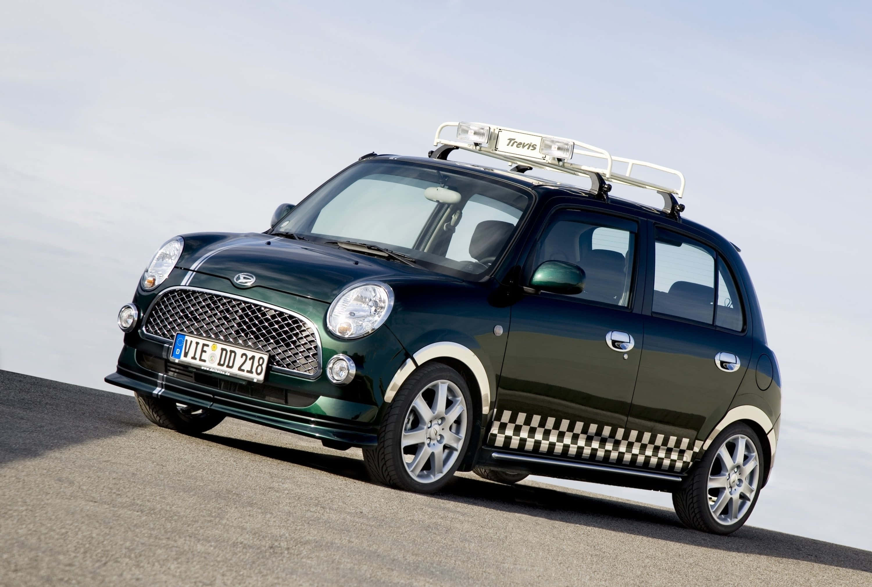 Sleek and Sporty Daihatsu in Urban Setting Picha ya Ukuta