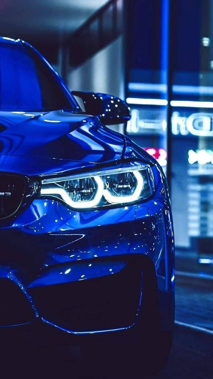 Taa ya Mbele Inayong'aa ya BMW ya Bluu Picha ya Ukuta