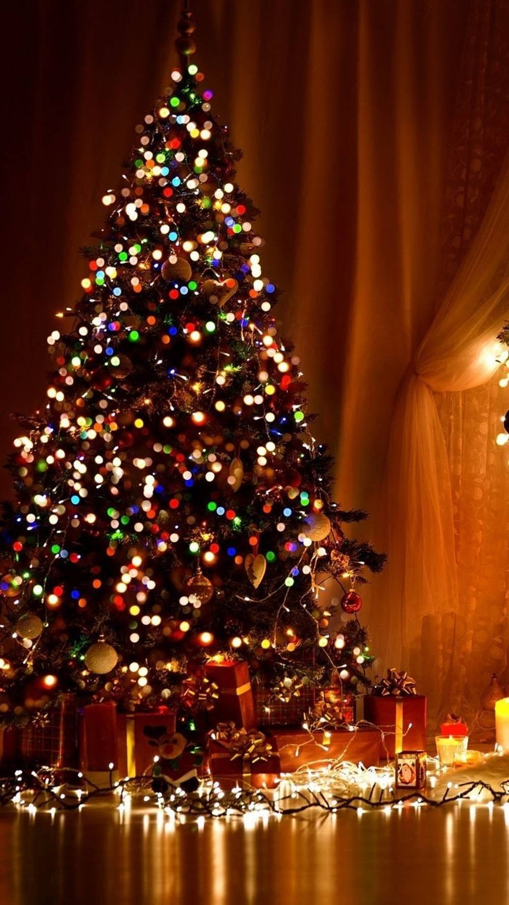 Taa za Krismasi zenye Rangi Mbalimbali Zinazoenea Picha ya Ukuta