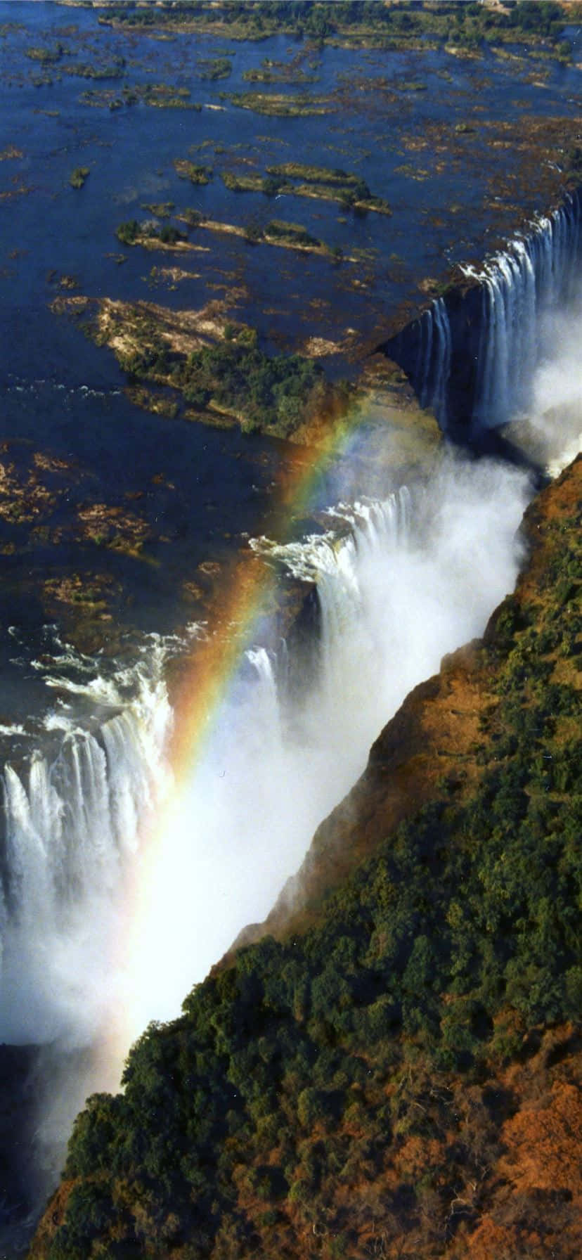 Victoria Falls With A Rainbow Picha ya Ukuta