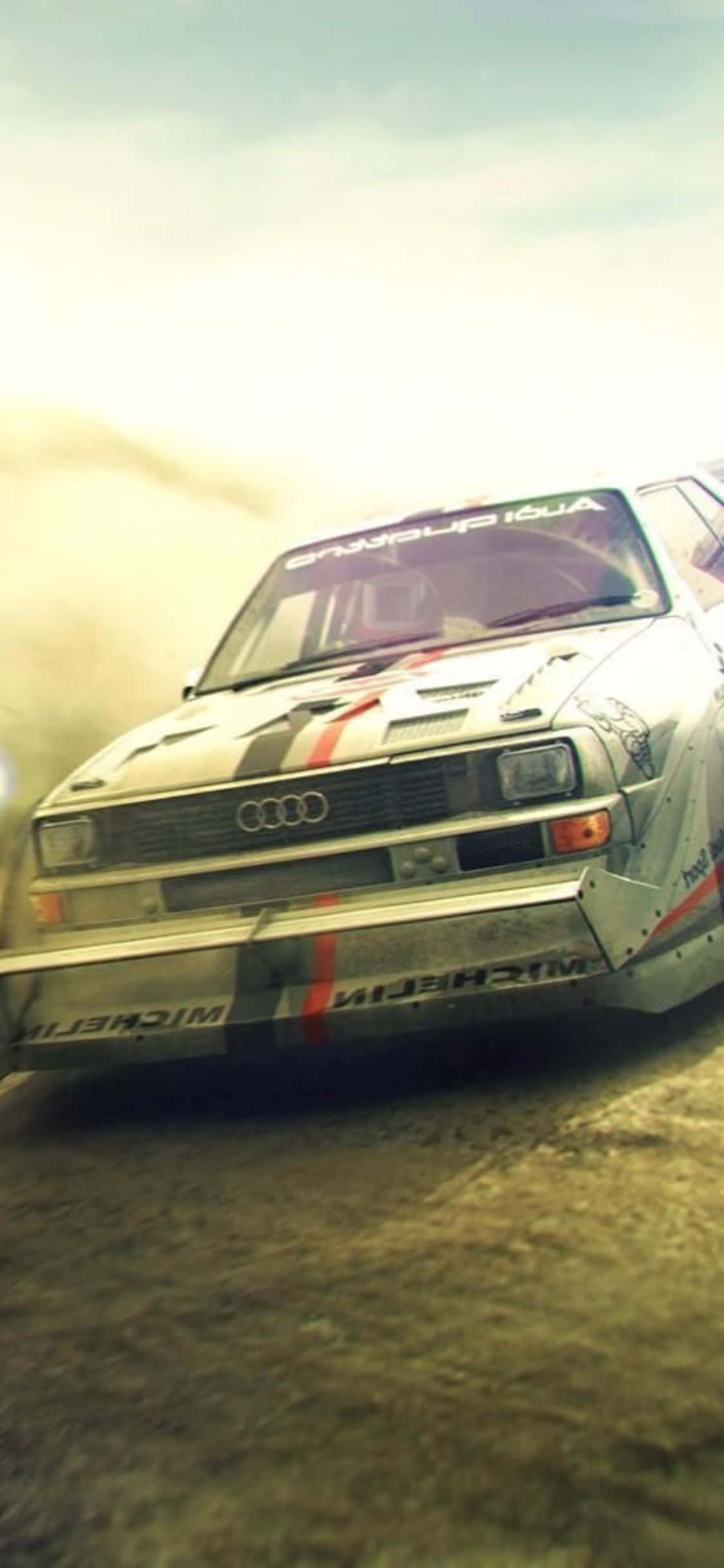 Wadereva Wabahati Wakusanya Mshindo wa Dirt Rally katika iPhone Xs Picha ya Ukuta