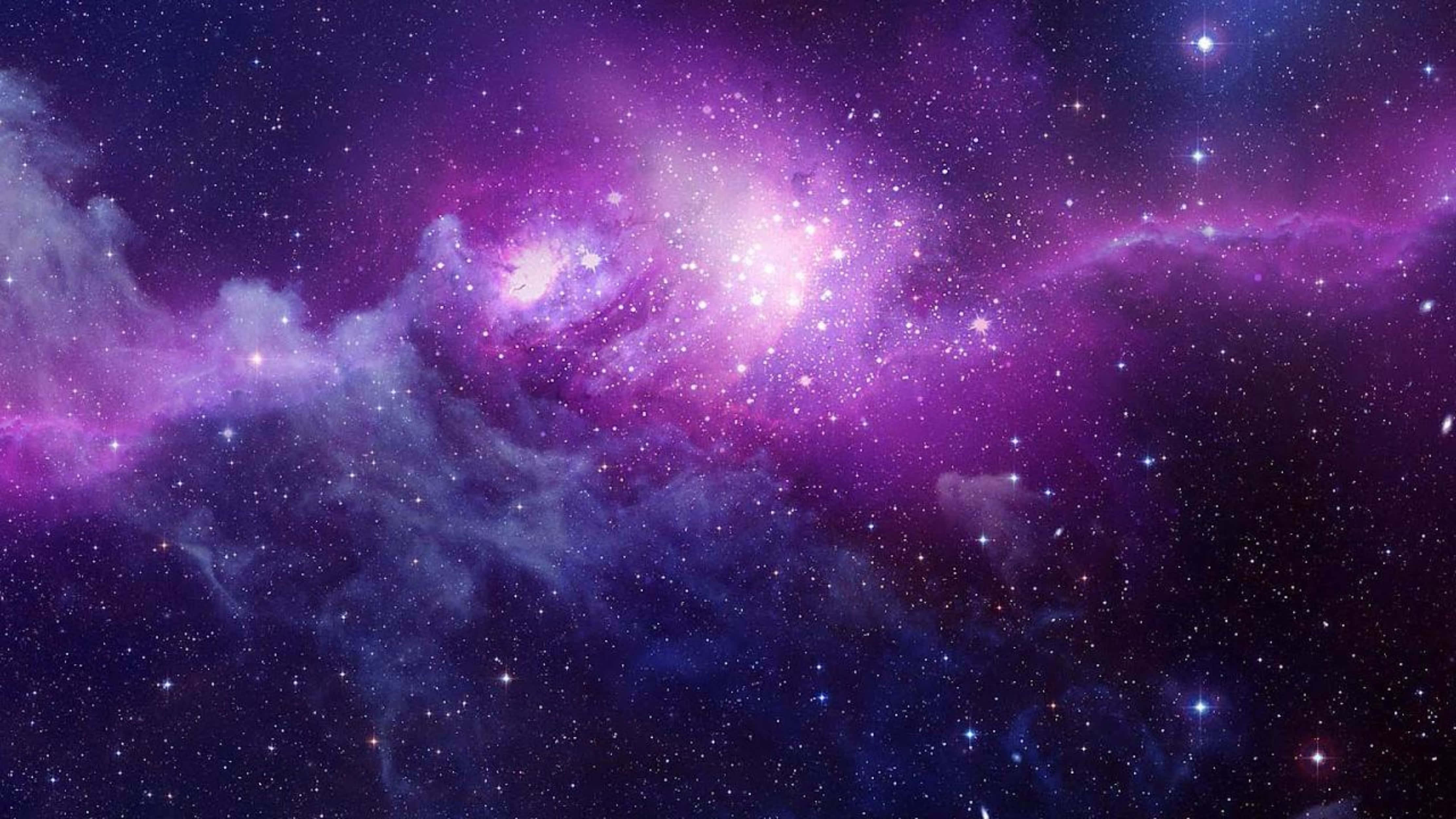 Wingu la Gesi ya Cosmic ya Zambarau ya Ulimwengu 4K Picha ya Ukuta