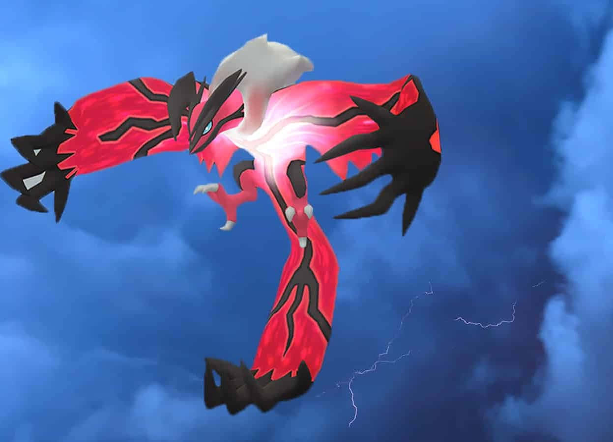 Yveltal wa Pokemon Anayeng'aa Angani Picha ya Ukuta