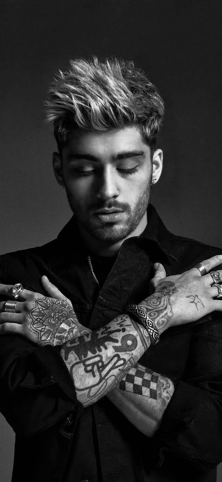 Zayn wa iPhone wenye tatoo Picha ya Ukuta