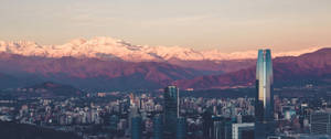 Ultrawide Horizon with buildings and a mountain with pastel reflection of light.