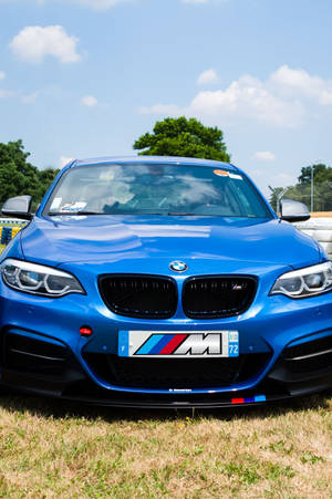 BMW ya Bluu ya Kupendeza kwenye Mwendo wa Kinyama — Xiaomi Pad Picha ya Ukuta