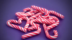 Candy Cane kwenye Background ya Purple — Studio Display Picha ya Ukuta
