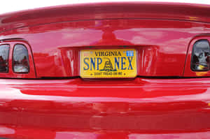 Caption: Close-Up Image of a Car License Plate — Surface Laptop Picha ya Ukuta