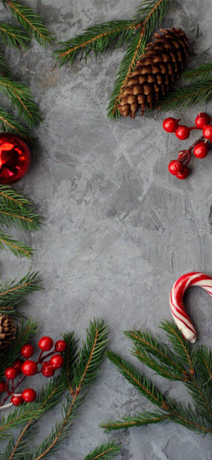 Christmas Candy Cane And Pines wallpaper — iPhone 18 Pro Picha ya Ukuta