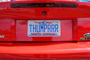 Customized Car License Plate on a Stylish Vehicle — MacBook Air M4 Picha ya Ukuta