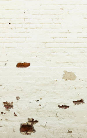 Shabby white brick wall with damaged lower half wallpaper — Galaxy Tab S10 Ultra Picha ya Ukuta