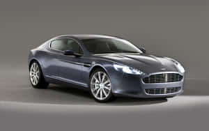 Exquisite Aston Martin Rapide S in motion — MacBook Air M1 Picha ya Ukuta