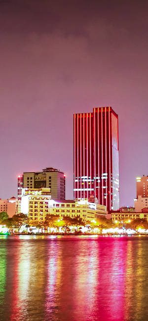 Ho Chi Minh city pink building wallpaper — iPhone 15 Picha ya Ukuta