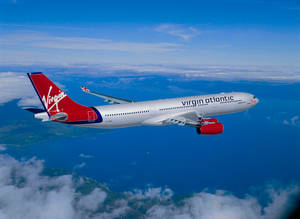 Kupaa kwa Airplane Virgin Atlantic — Anga la Bluu Picha ya Ukuta