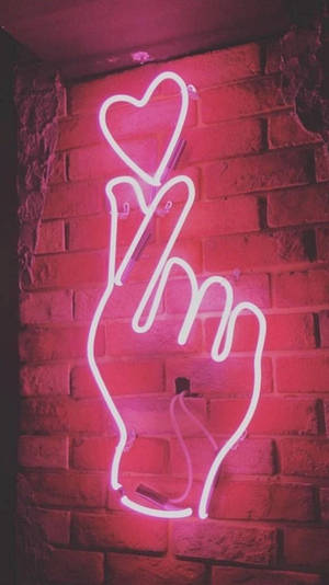 Moyo wa Kidole Taa ya Neon Kwenye Ukuta wa Matofali — Neon Picha ya Ukuta
