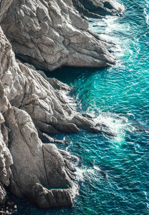 Rock structure and waves wallpaper — Oppo Pad 5 Pro Picha ya Ukuta