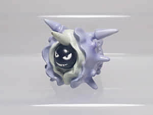 Picha ya karibu ya kifaa cha kuchezea cha plastiki cha Cloyster — Pokemon baridi Picha ya Ukuta