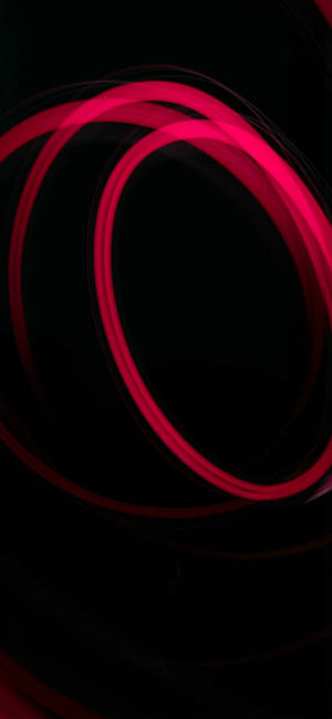 Red circles glowing wallpaper — iPhone 15 Picha ya Ukuta