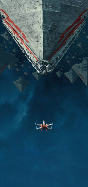 Picha ya ukuta ya Star Wars ya spaceship juu ya mbingu ya bluu safi na majengo yanayofurahi