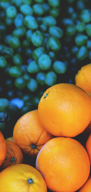 S10 oranges and grapes wallpaper. — iPhone 17 Pro Picha ya Ukuta