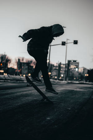 Skater Boy Doing Heelflip wallpaper.