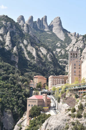 Stunning Cliffside View of Montserrat Monasteries — Huawei MatePad Air (2025) Picha ya Ukuta