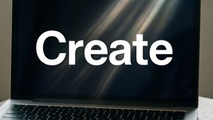 Tapeta la MacBook lenye mwonekano wa kihalisia lenye neno 'Undua' kwa mwandiko mzito.
