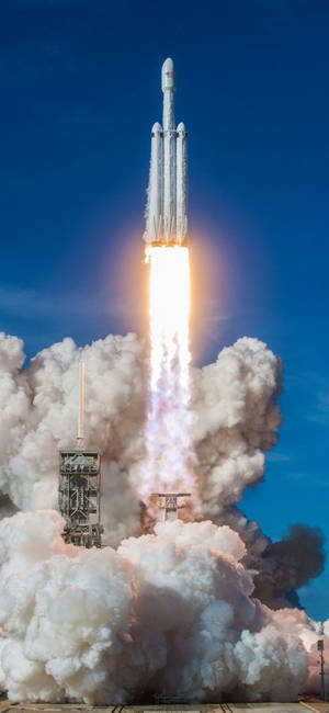 Picha ya kipochi ya uzinduzi wa SpaceX Falcon Heavy — iPhone 18 Pro Picha ya Ukuta