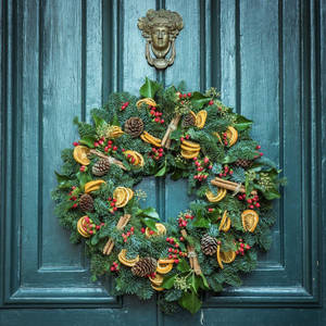 Wreath ya Krismasi na slices za orange wallpaper — 1:1 Picha ya Ukuta
